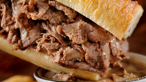Beef-on-weck sandwich made with thin-sliced grassfed rump roast and horseradish