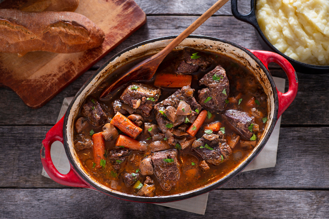 Beef stew simmering in a Dutch oven, made with grassfed stew meat from Tyner Pond Farm