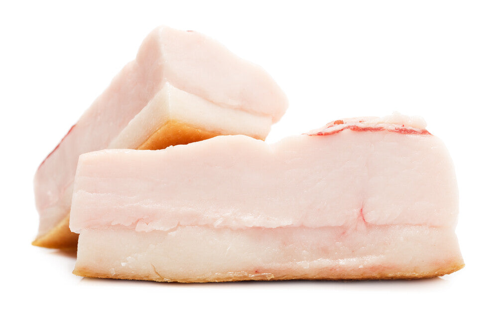 Raw grassfed beef suet packaged in butcher paper, from pasture-raised cattle at Tyner Pond Farm in Indiana