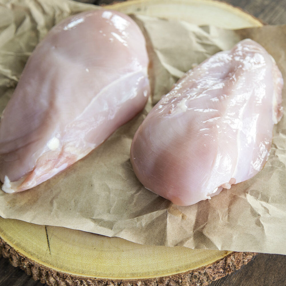 Raw boneless skinless chicken breasts from pasture-raised birds