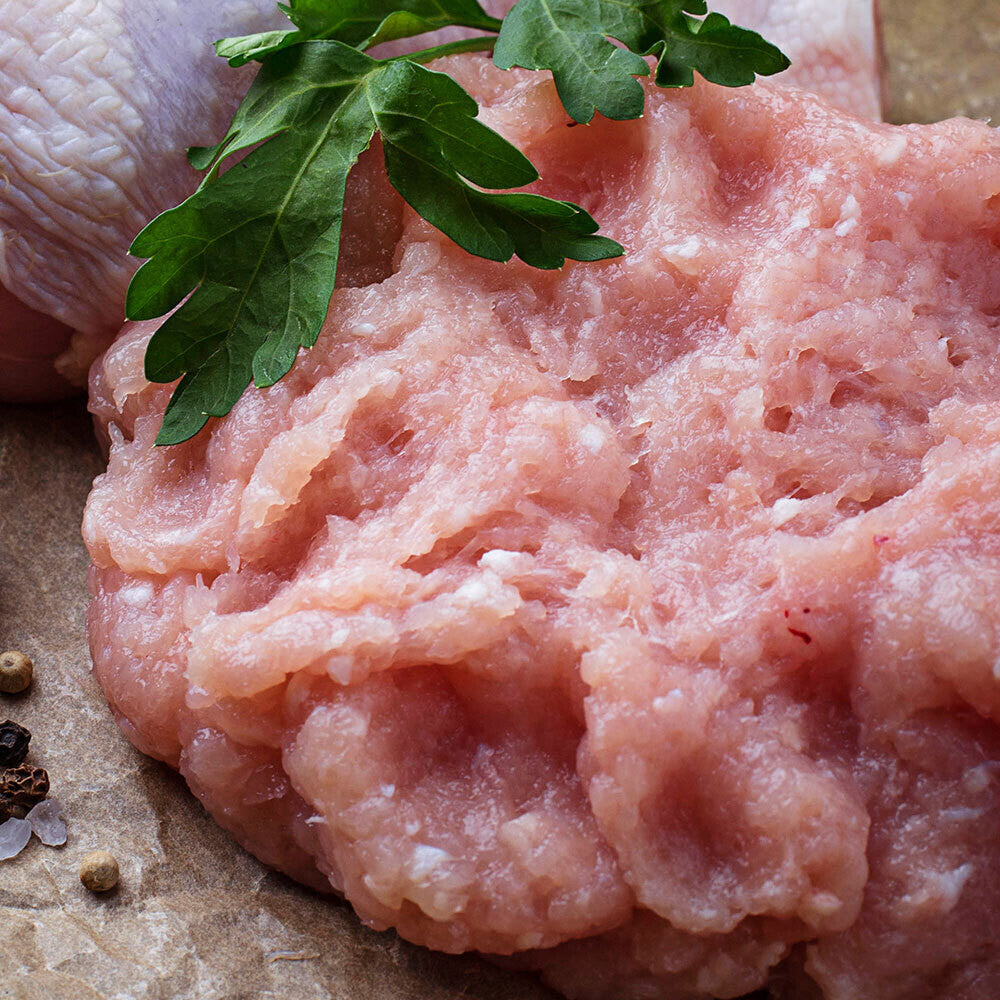 Raw pasture-raised ground chicken in a one-pound portion