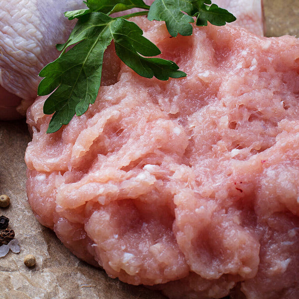 Raw pasture-raised ground chicken in a one-pound portion