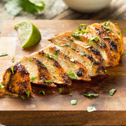 Sliced cooked boneless chicken breast ready to serve