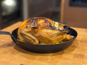 Whole roasted pasture-raised chicken with browned skin